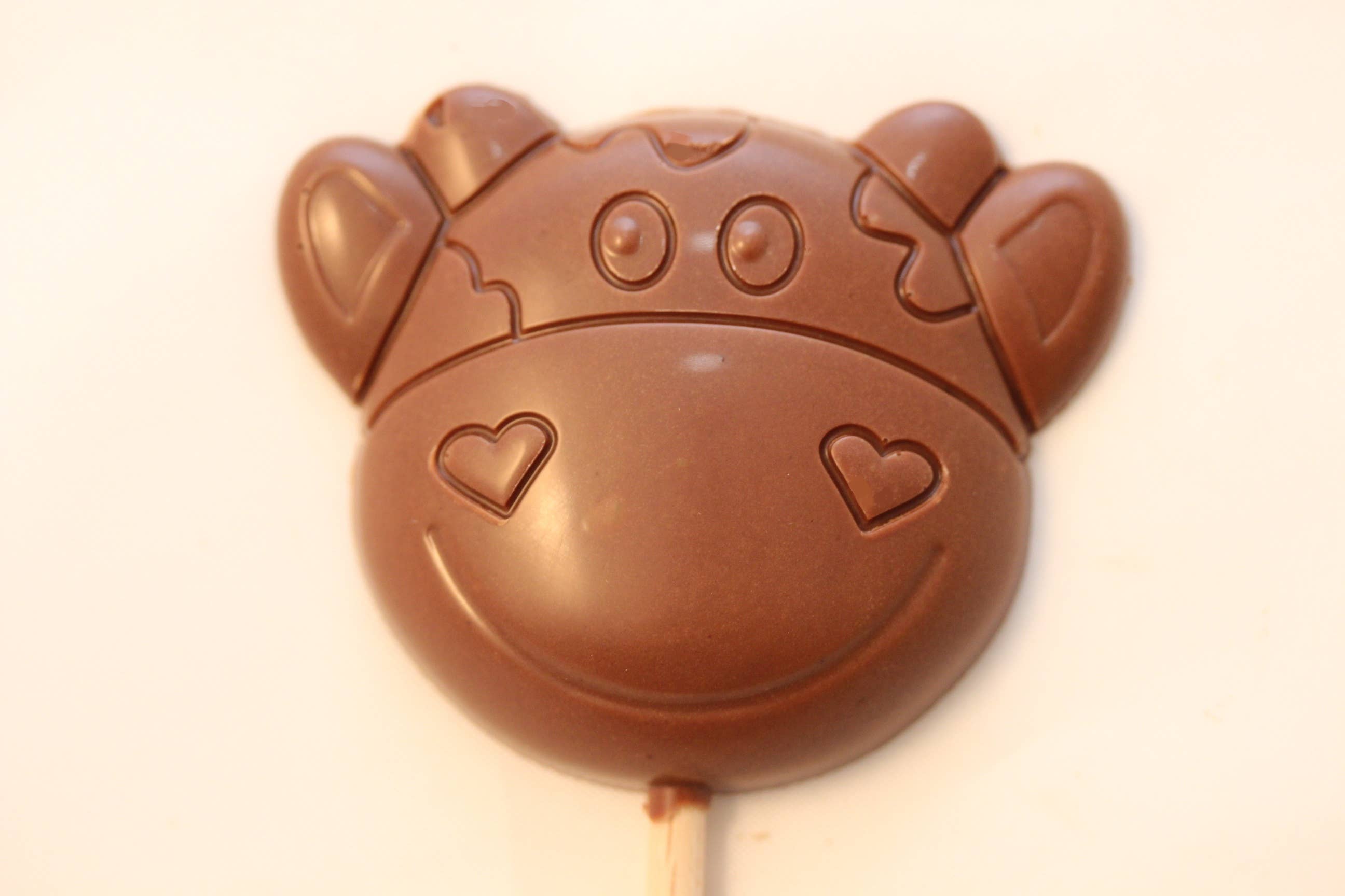 Royale Normande Chocolaterie – Großhandel Süßigkeiten mit Schokoglasur – Milchschokoladen-Lutscher Kuh 18 g - S003