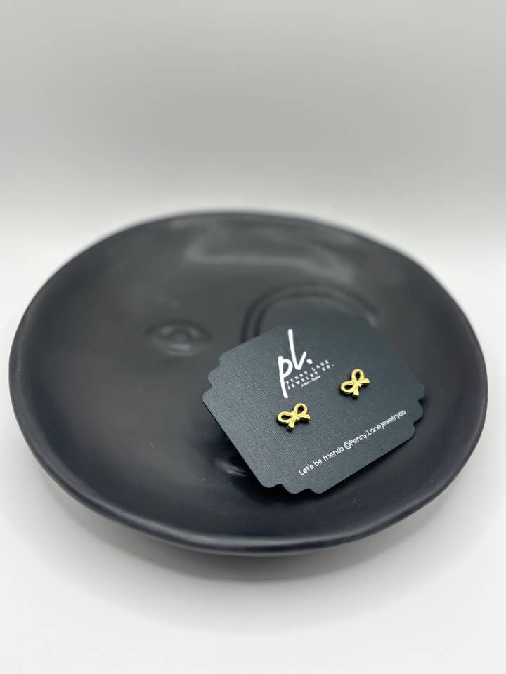 Porte-bijoux minimaliste en forme de visage pour la vente par Penny Lane Jewelry Co