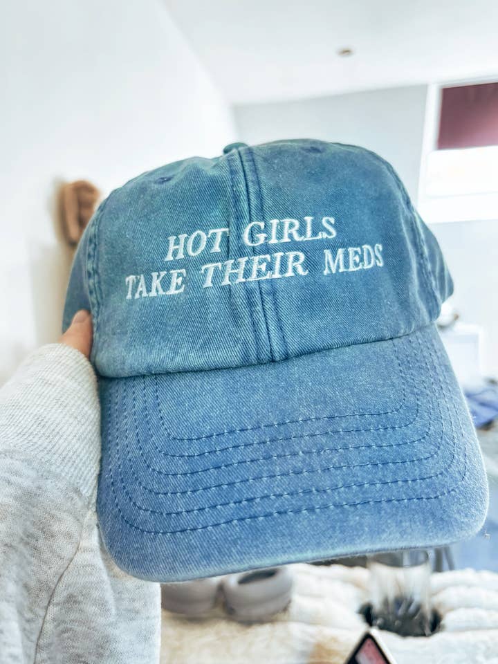 Hot Girls Take Their Meds embroidered baseball cap for wholesale by Tired Girl Apparel