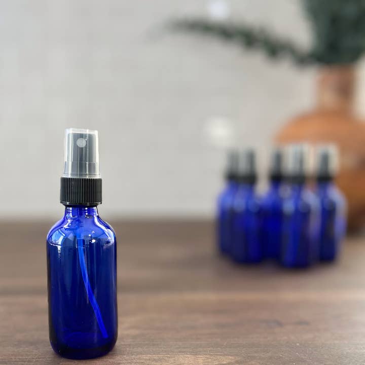 The Bottle Shoppe - Wholesale Essential Oil Holder - 2oz Cobalt Blue Glass Bottle with Black Mist Sprayer1