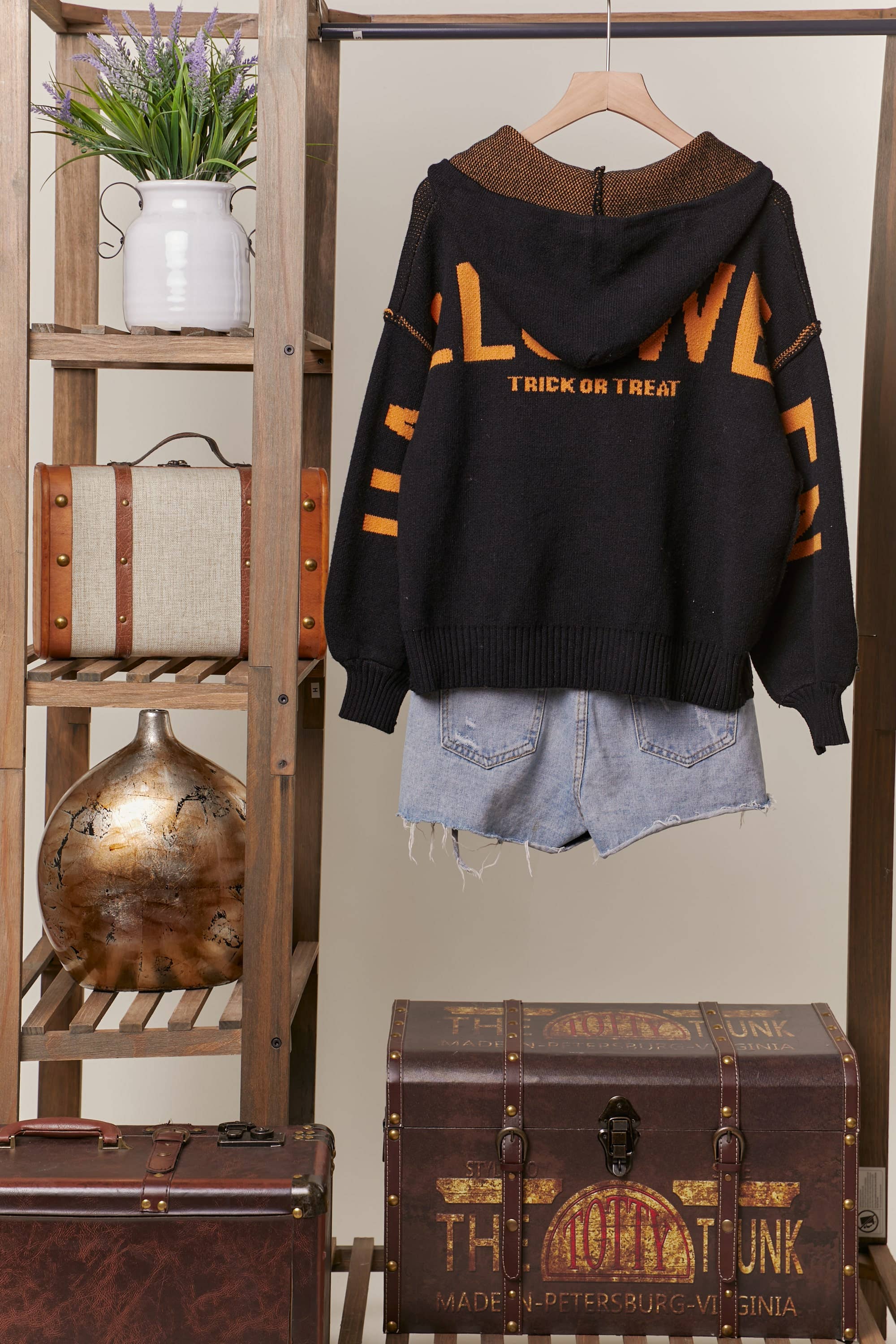 Black Hooded Halloween Sweater with Jaco O Embroidery for wholesale on Faire6