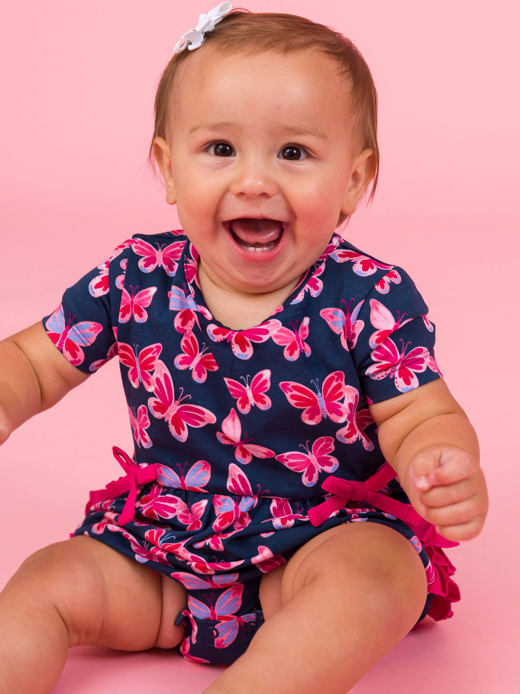 Navy Baby Girls Butterfly Bliss Knit Short Sleeve Bow Bubble Romper for wholesale on Faire1