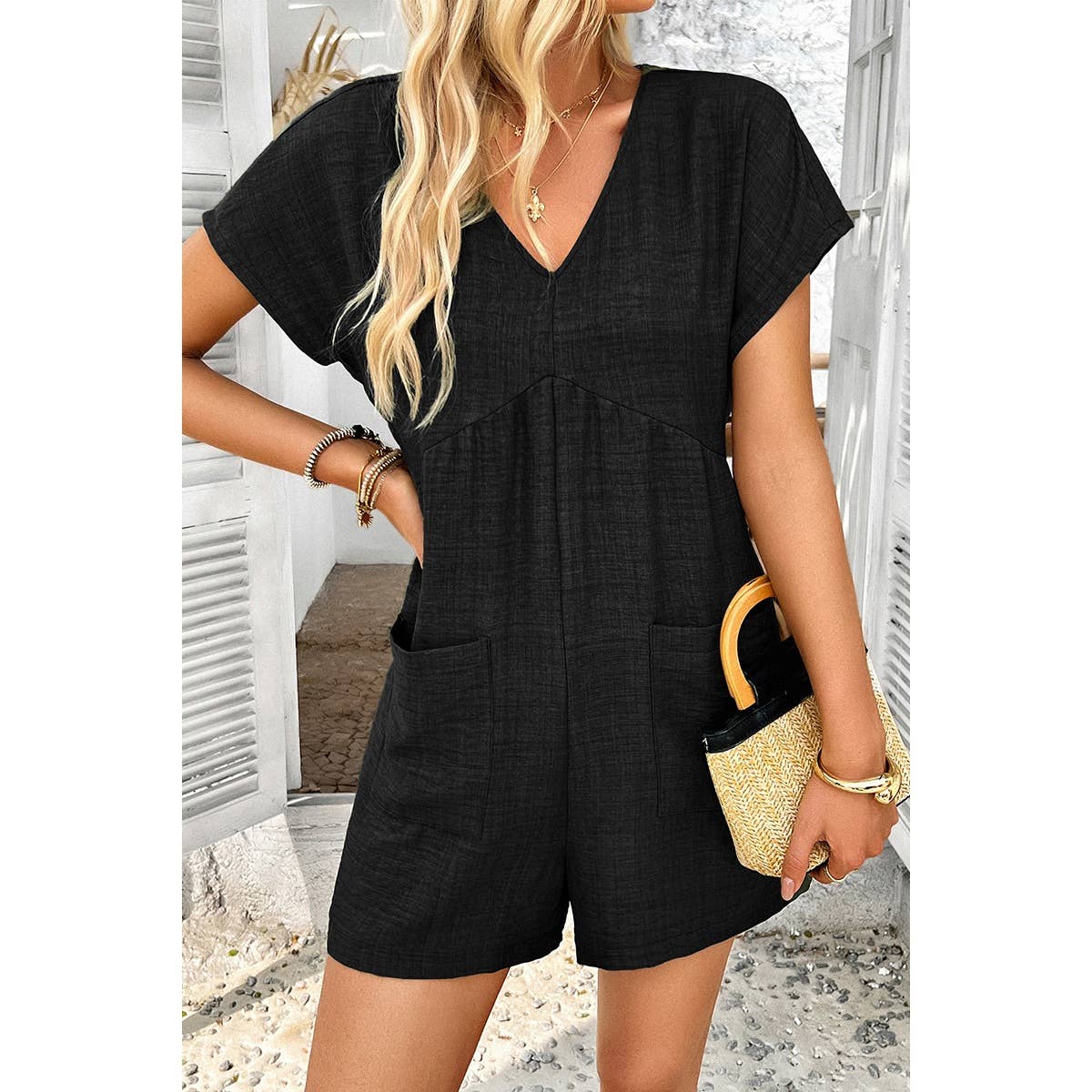 Elings – Großhandel Romper – Damen – Solider Tiefer V-Ausschnitt Drop-Shoulder-Loser Jumpsuit mit Taschen3