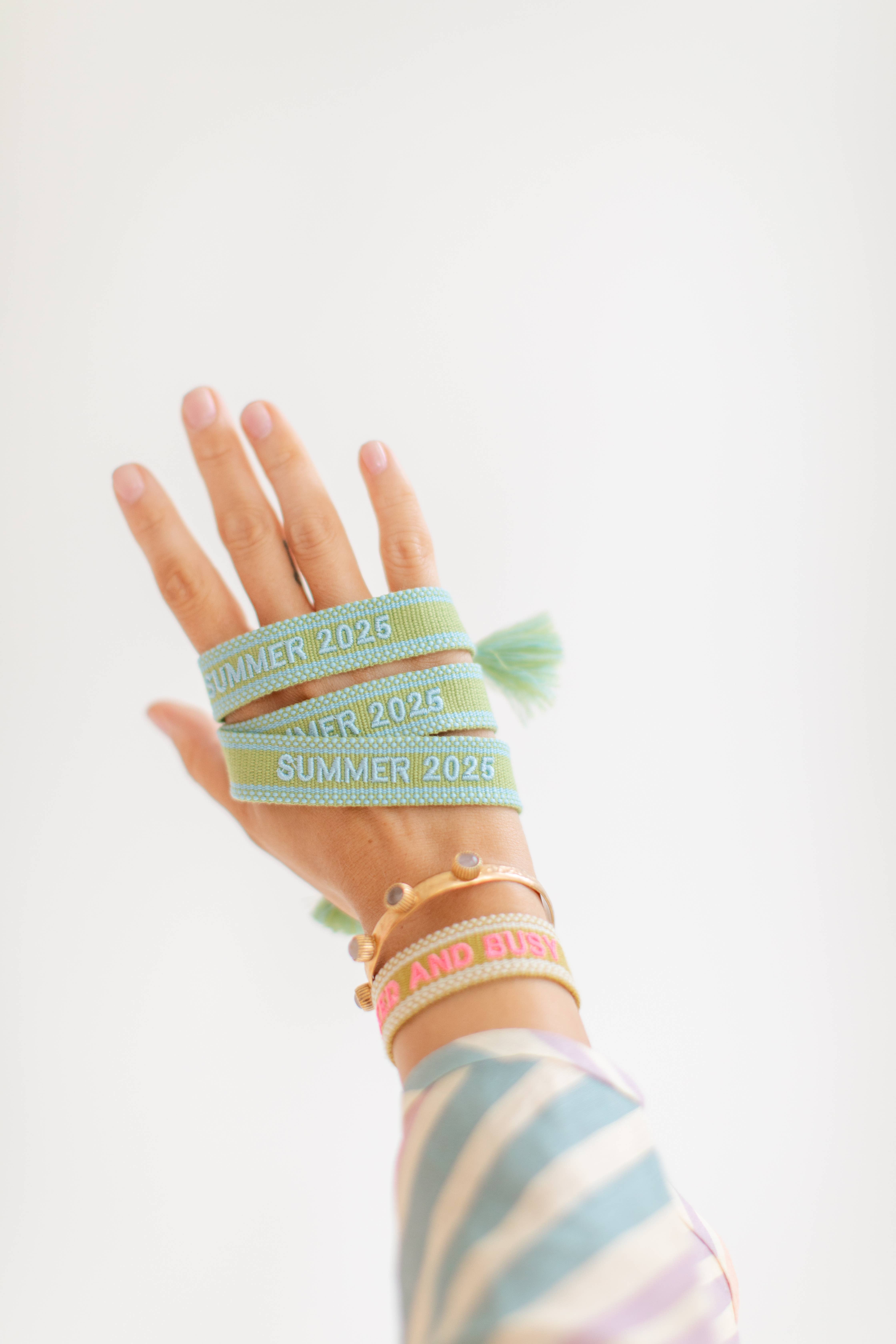 The Kenzie Collective โ wholesale Woven/braided bracelet โ Summer 2025 embroidered tassel bracelet