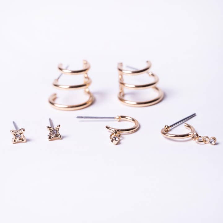 Pack de mini créoles dorées avec étoile et pendentif cristal pour la vente par Borne Design