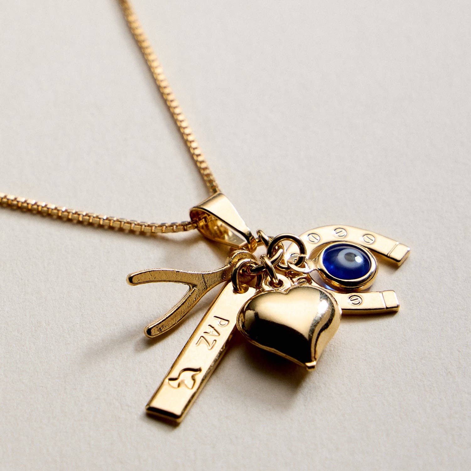GD Gold Filled Charm Necklace – Heart, Horseshoe, Evil Eye & Wishbone Pendant for wholesale on Faire2