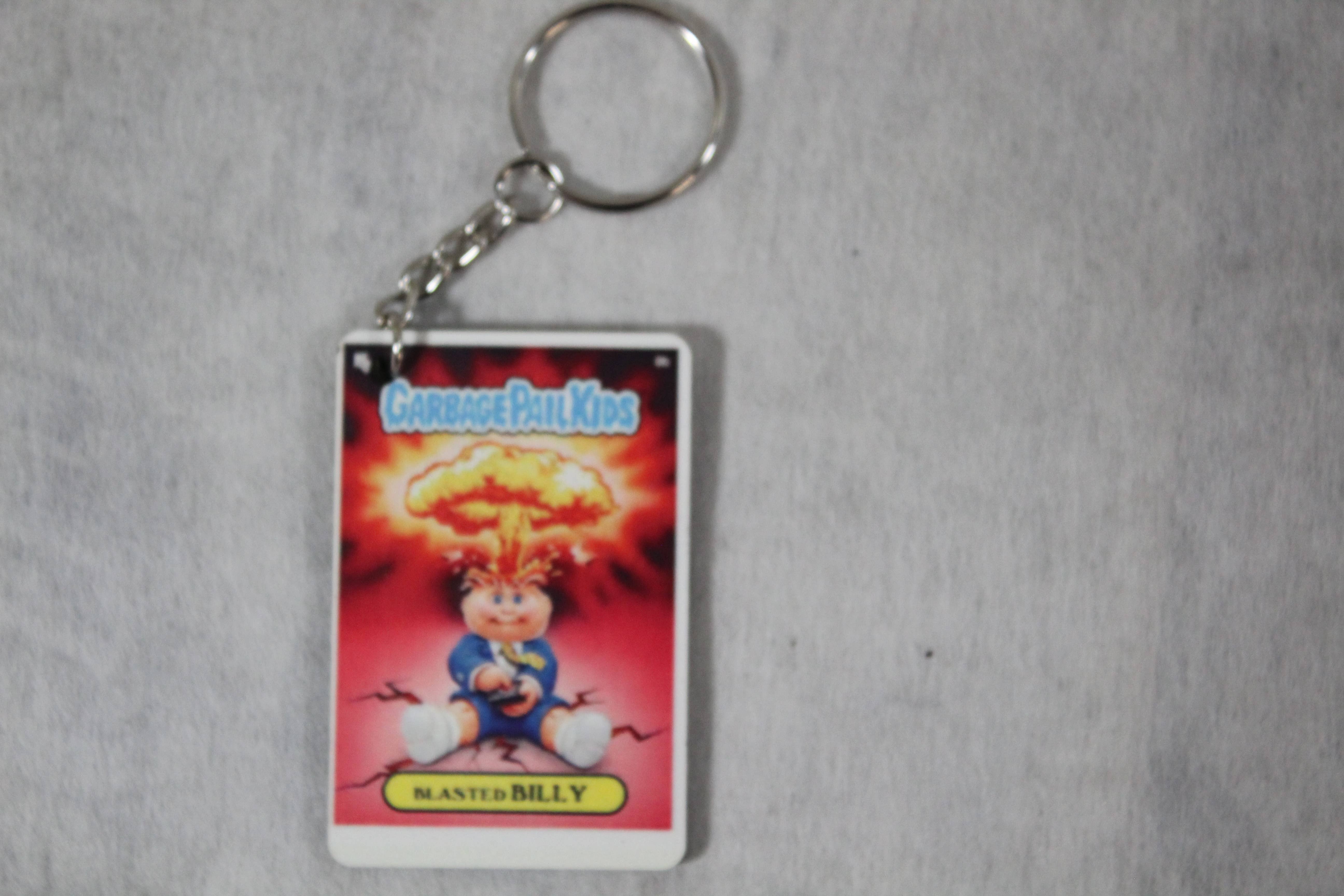 Raven Design – wholesale Keychain – Unisex – Garbage Pail Kids Blasted Billy Keychain0