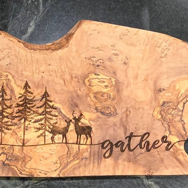 Deer Gather Cutting Board, Olive Wood, Charcuterie Board for wholesale by Black River Arts