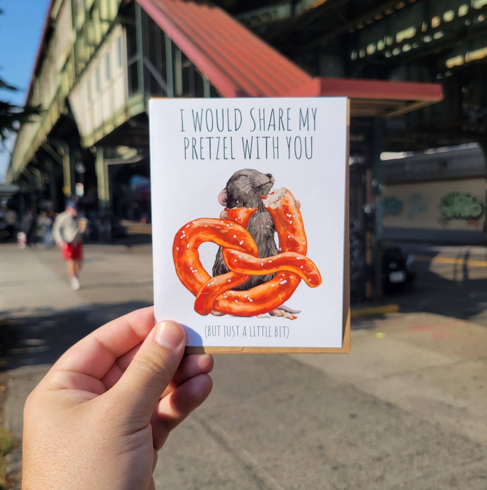 Santi of all Trades - Wholesale Everyday Greeting Card - Pretzel Rat Greeting Card | Lost in the City
