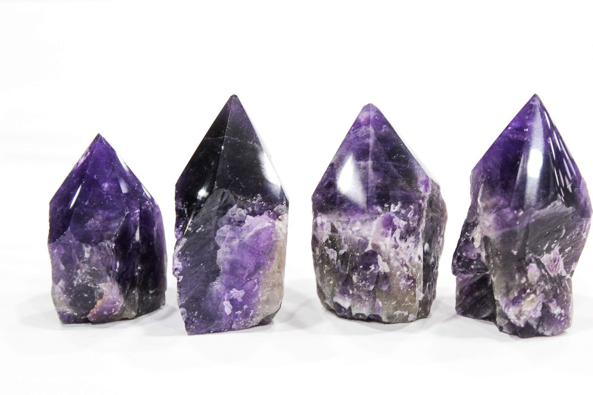 Quasar Gems USA - Wholesale Spiritual Stone/Crystal - Dark Amethyst Polished Top Points Per Pcs