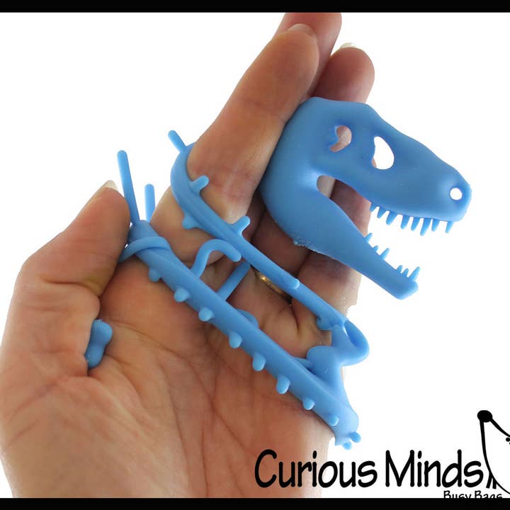 Curious Minds Toys – Großhandel Fidget Toy – Kinder – 1 x dehnbares Nudelband mit Dinosaurierskelett und fossilem Knochen3