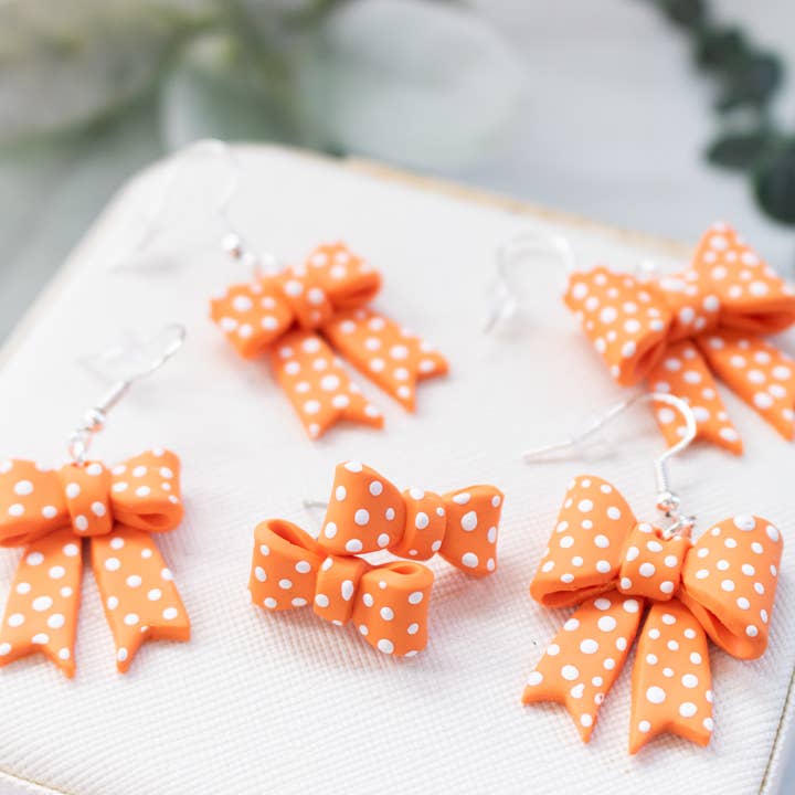 EJ Clay Co - Wholesale Dangle earrings - TN Vols Orange & White Polka Dot Bows