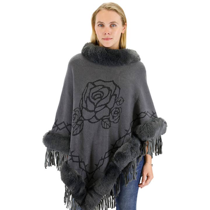 SURTIDO PONCHO DE PIEL CON FLECOS Y ESTAMPADO DE ROSAS 196 de venta al por mayor en Faire