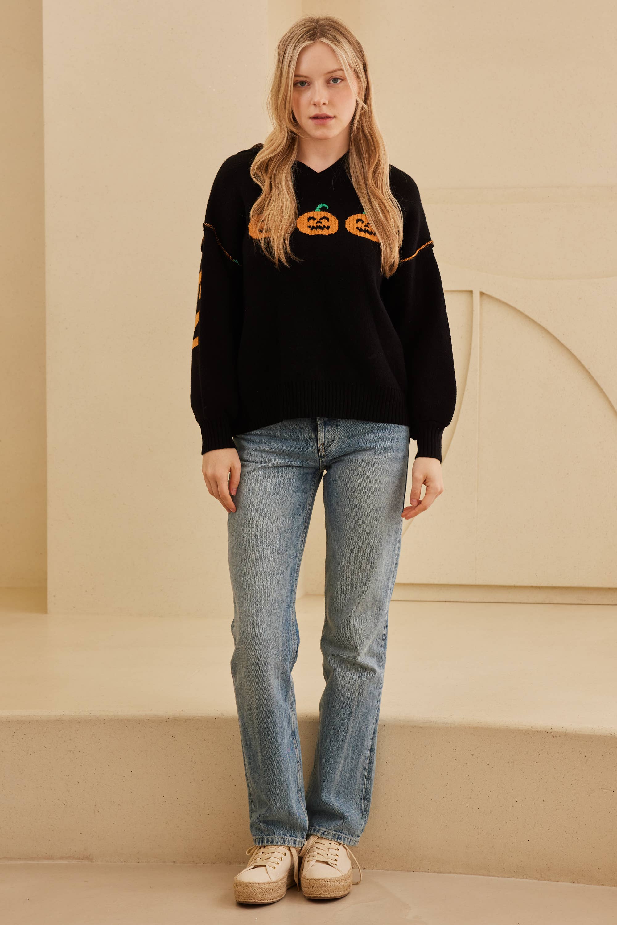 Black Hooded Halloween Sweater with Jaco O Embroidery for wholesale on Faire1