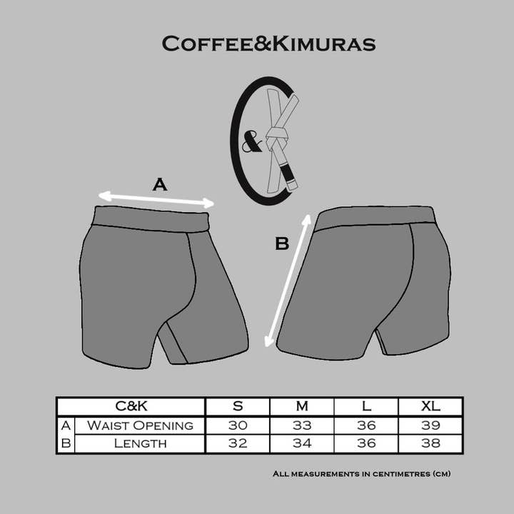 Pantaloncini Vale Tudo bianchi piatti per la vendita all'ingrosso da parte di COFFEE&KIMURAS