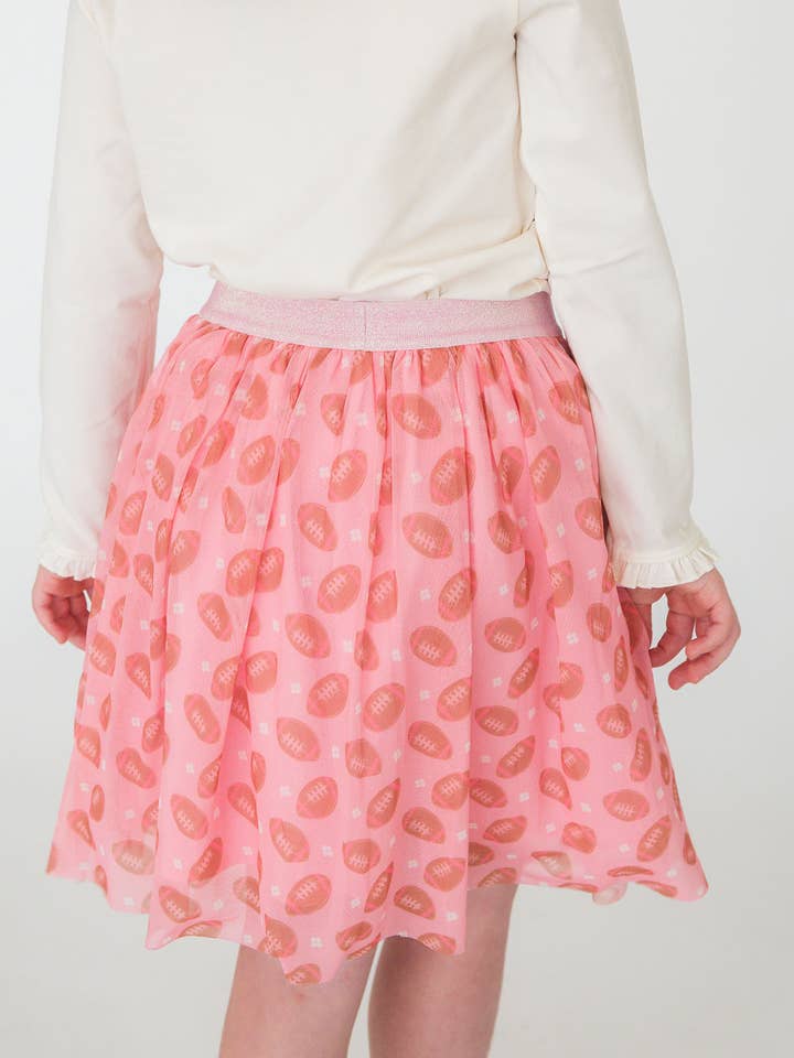 Jupe en tulle à taille élastique Fleurs & Passes Football pour filles pour la vente par RuffleButts + RuggedButts
