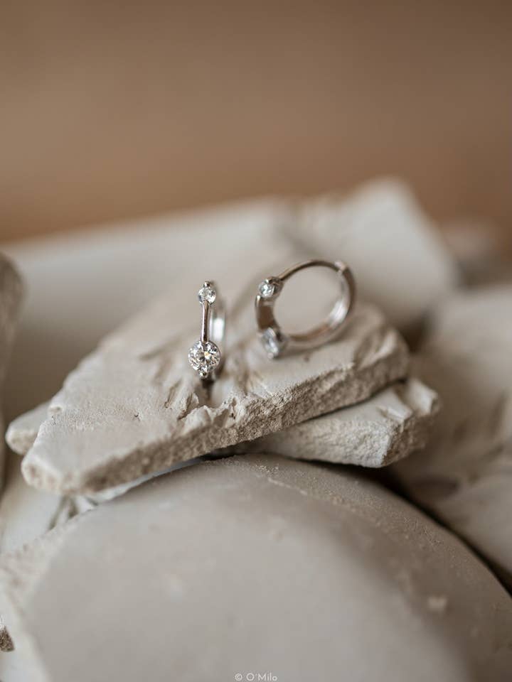 Twin Crystal Huggies. Evi for wholesale by O'Milo