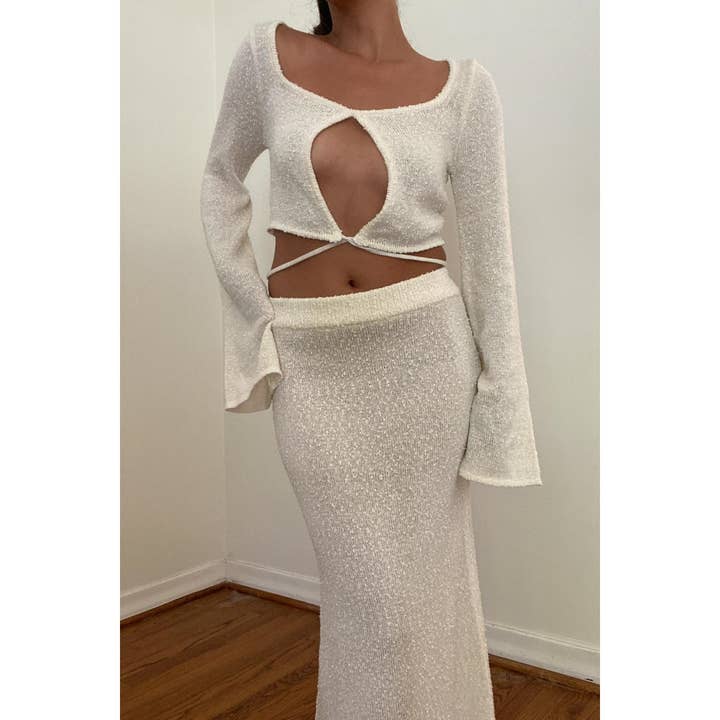 STRUKTURIERTES STRICKTOP MIT BINDEBAND UND MAXIROCK für den Großhandel von Salty