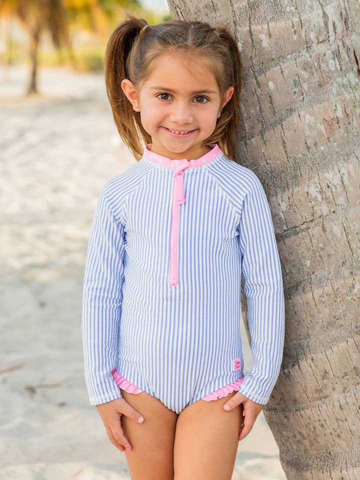 Girls Periwinkle Blue Seersucker Long Sleeve One Piece Rash Guard Swimsuit
for wholesale by RuffleButts + RuggedButts