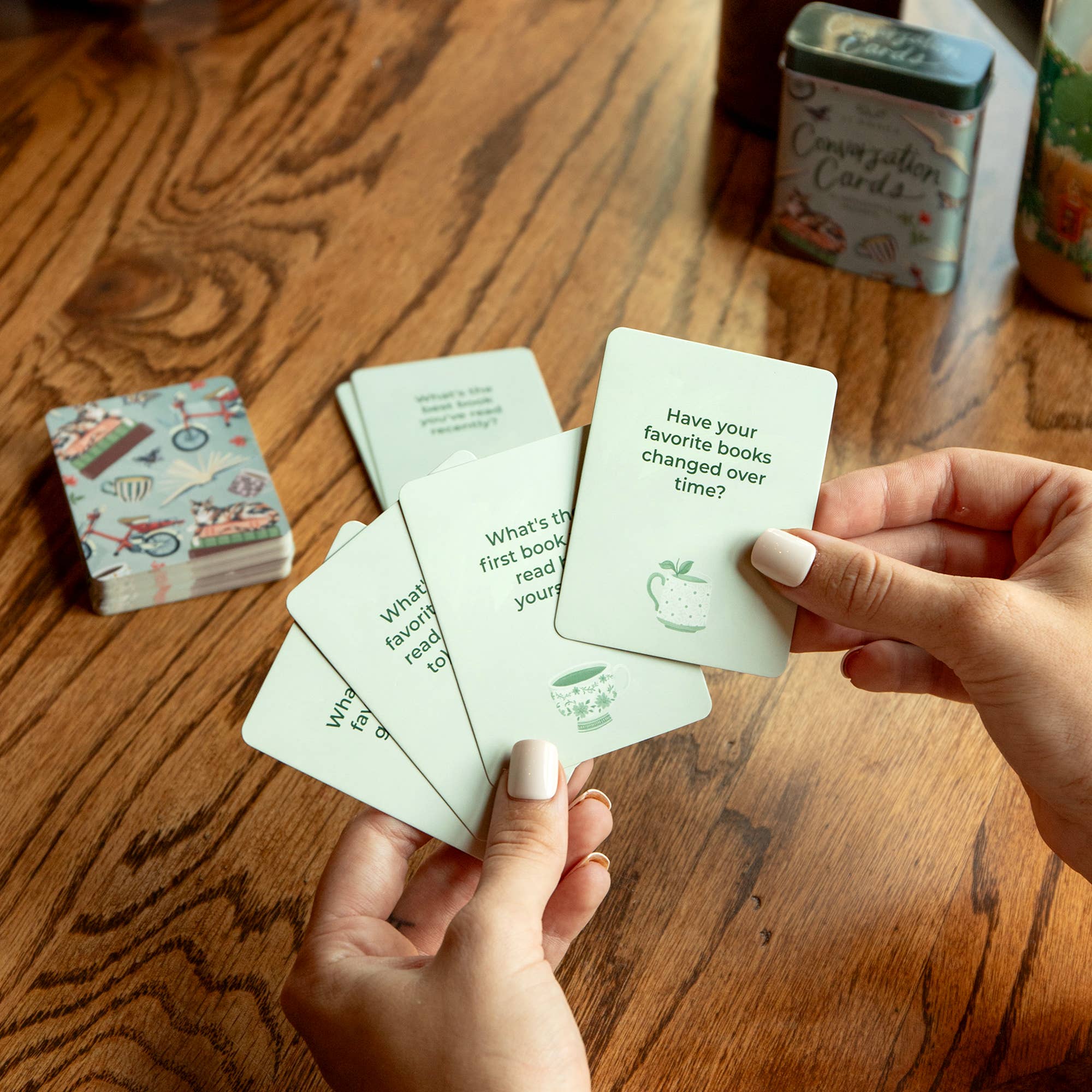 1canoe2 | One Canoe Two Paper Co. - Wholesale Card Game - Bookish Conversation Starters - Deck of Cards + Storage Tin2