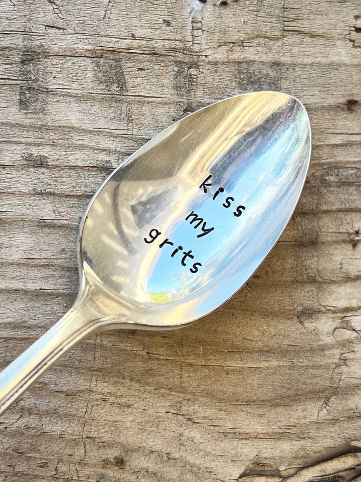 Kiss my grits teaspoon for wholesale by Pumpernickel and Wry
