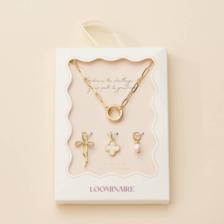 Gold Dipped Bow Charm Necklace with Clover and Pearl for wholesale on Faire