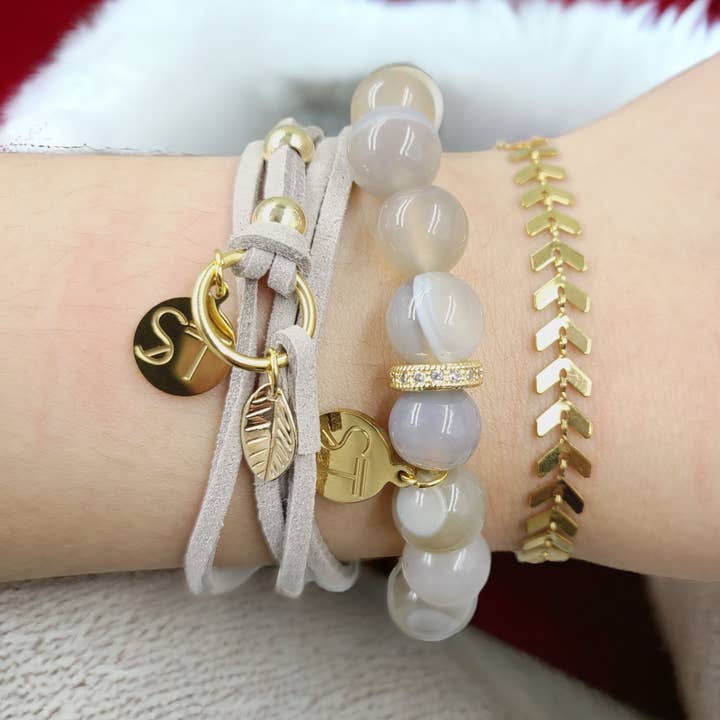 Tåget Armbåndsstak for engroshandel hos Skyscrapers and Trees