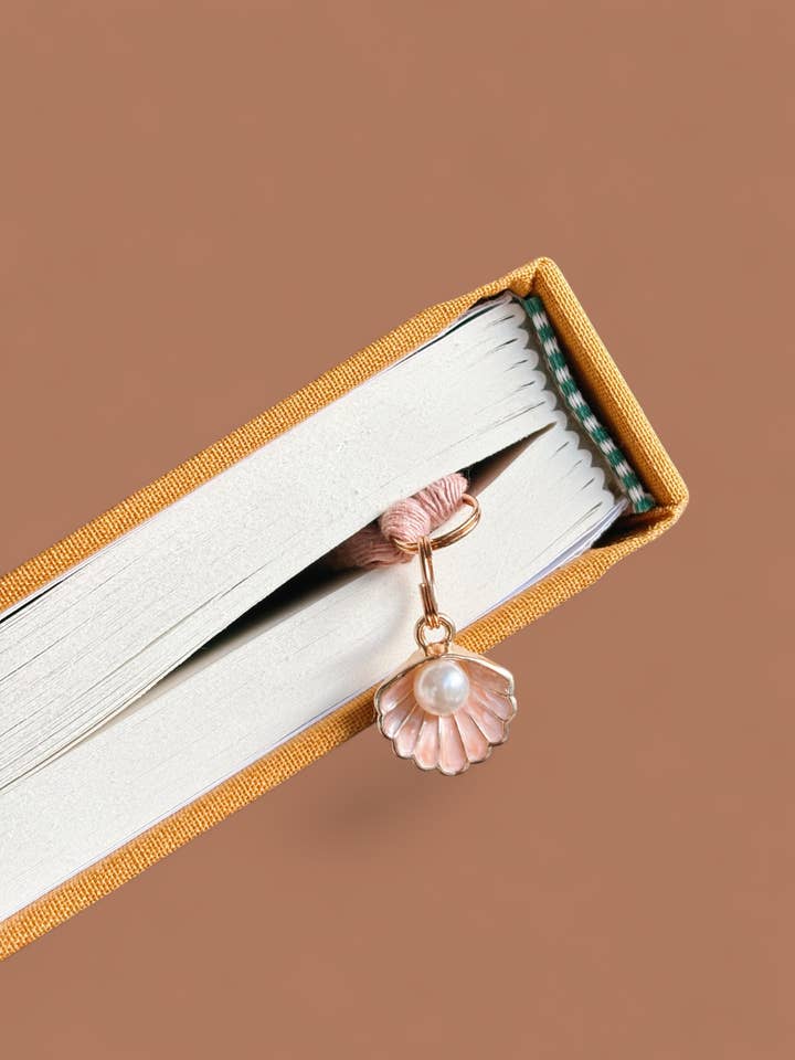 Pearl Seashell Charm Bookmark - Cozy Gift for Readers for wholesale by Offhand Fibers