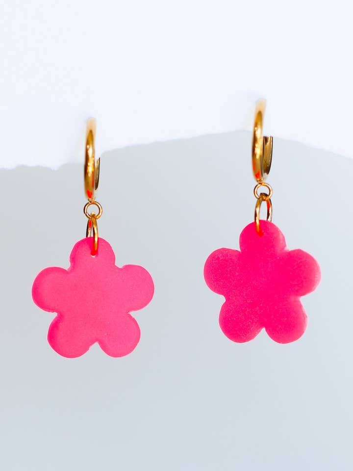 Cute floral statement earrings made from crystal resin for wholesale by Ollicraft Jewelry