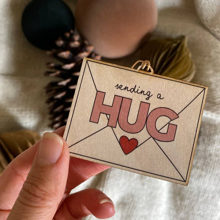 Sending a Hug wooden hanging decoration | Christmas keepsake for wholesale by Fearless Flamingo