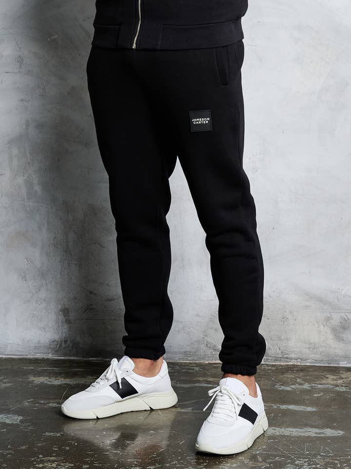 Pantaloni tuta Alexander neri per la vendita all'ingrosso da parte di Jameson Carter