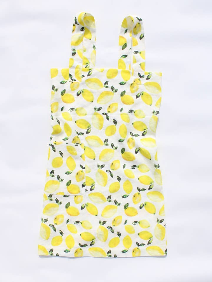 Linen cross back apron Watercolor Lemons for wholesale by Blue Summer House