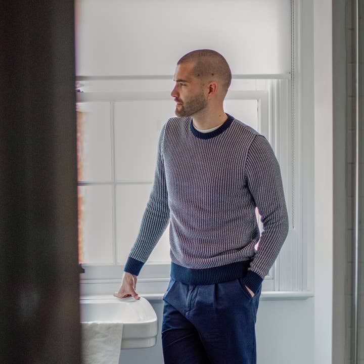 Maglione uomo in 100% cotone con lavorazione tuck stitch stile pescatore per la vendita all'ingrosso da parte di Paul James Knitwear