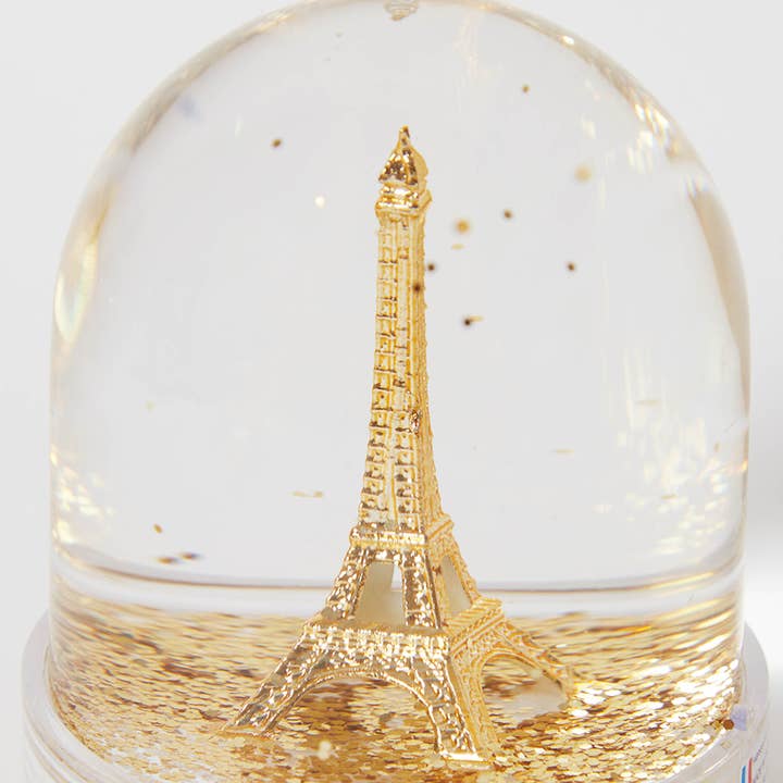 Eiffel Tower snow globe with golden glitter for wholesale by Les Parisettes