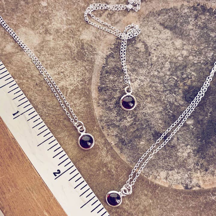 kepler 407 / itty bitty garnet & sterling silver necklace for wholesale by Peacock & Lime
