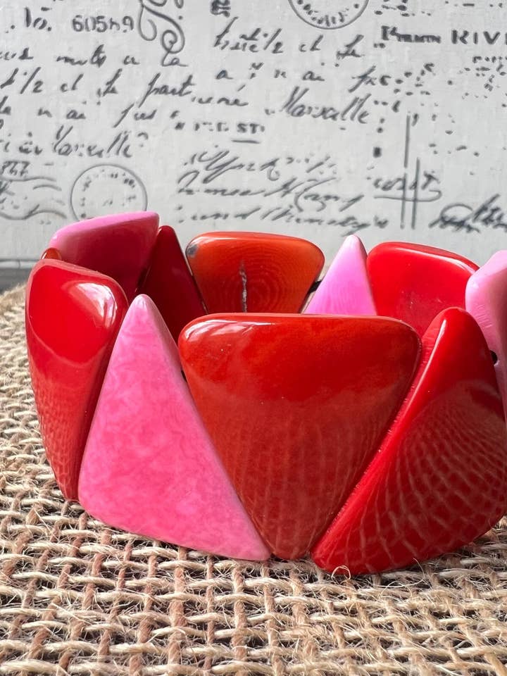 Red orange and pink Tagua jewelry Beaded stretch bangle Adjustable bracelet Huge statement bangle Wearable art for wholesale by Galapagos Tagua