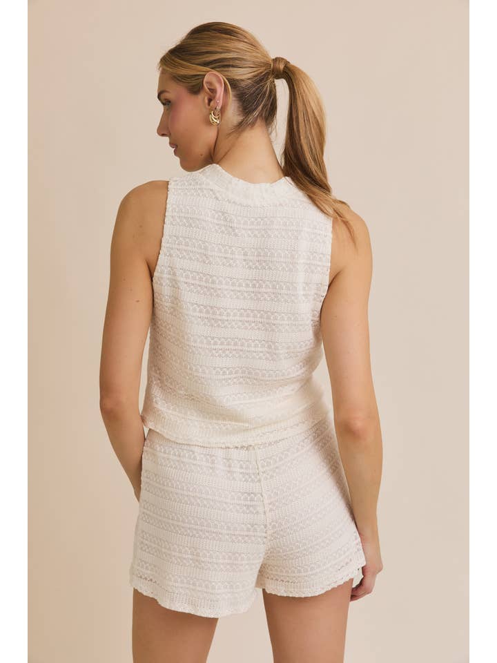 CREAM BUTTON UP SLEEVELESS CROCHET TOP AND WAIST TIE CROCHET SHORT for wholesale on Faire