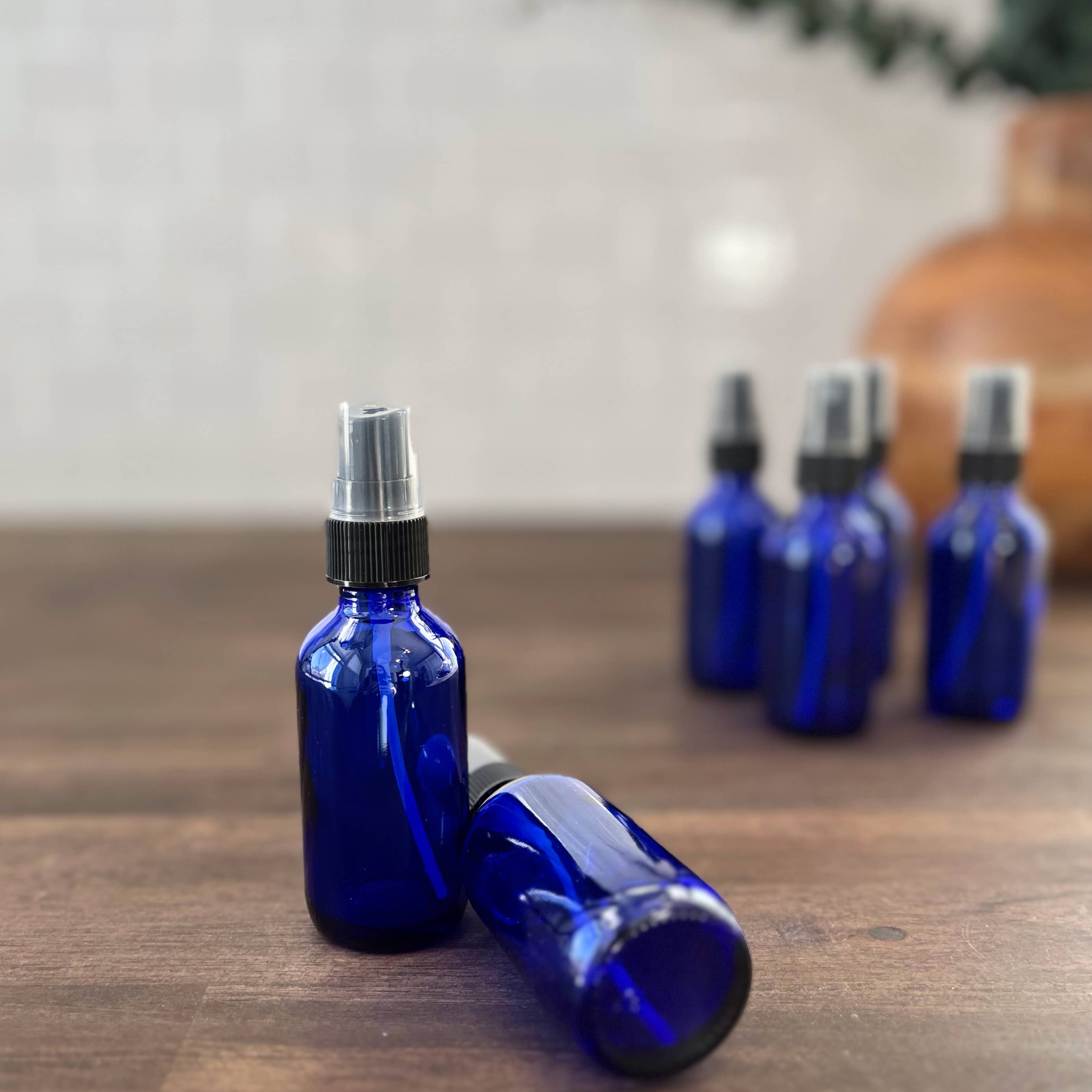 The Bottle Shoppe - Wholesale Essential Oil Holder - 2oz Cobalt Blue Glass Bottle with Black Mist Sprayer3