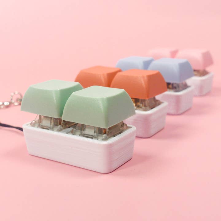 Strudel3D - Wholesale Fidget Toy - Kids - 2x1 Mechanical Fidget Keychain - Pastel Colors