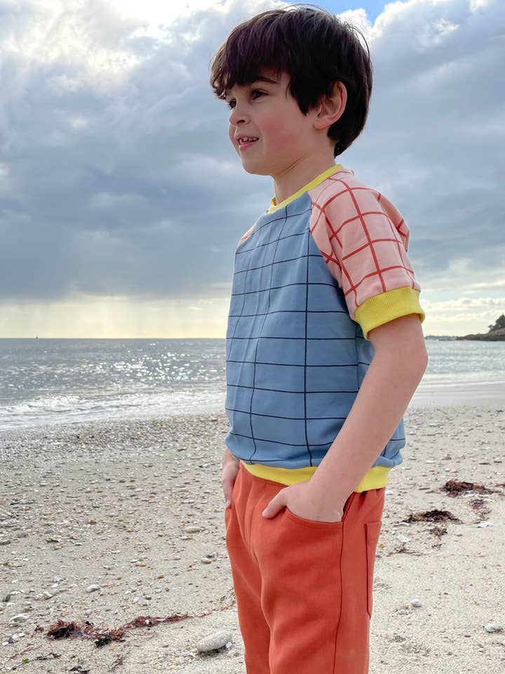 Indossa la maglietta per la vendita all'ingrosso da parte di Bibi Tchok