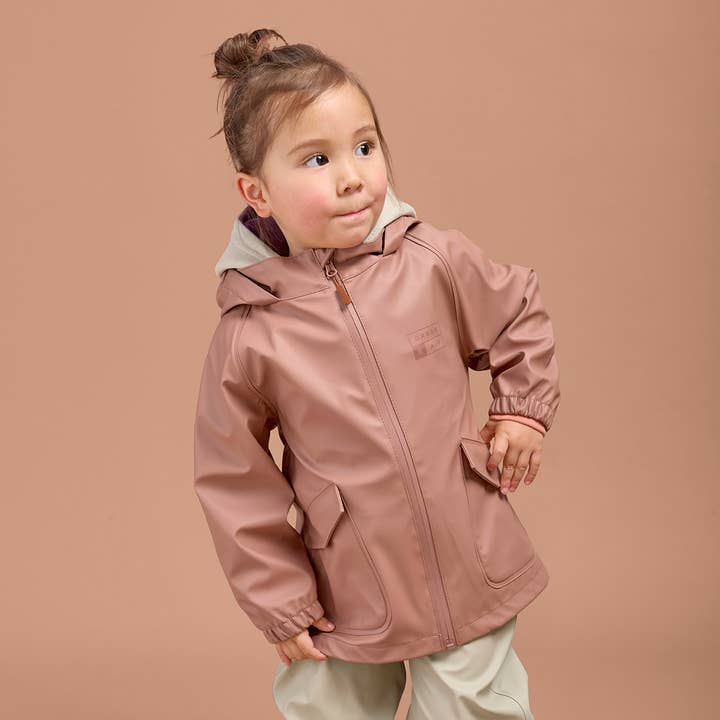 Veste de pluie rose pour enfants pour la vente par Grass & Air