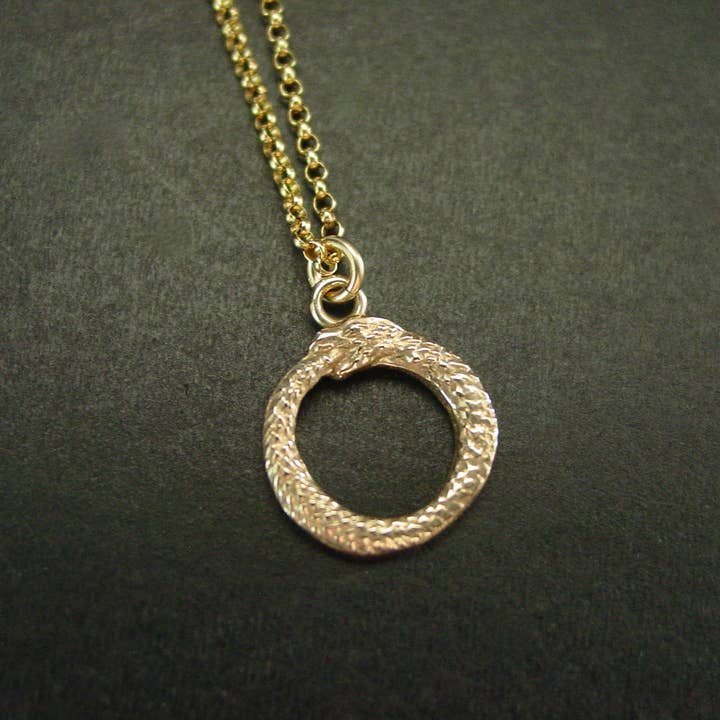 Ouroboros Necklace - Tiny Hand Sculpted Pendant and other Purchase Wholesale ouroboros. Free Returns & Net 60 Terms on Faire trending on Faire.