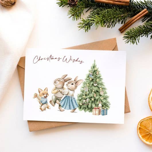 Conejitos bailando en Navidad, tarjeta de Navidad de tamaño 5 × 7 para venta al por mayor de Once Upon a Print UK