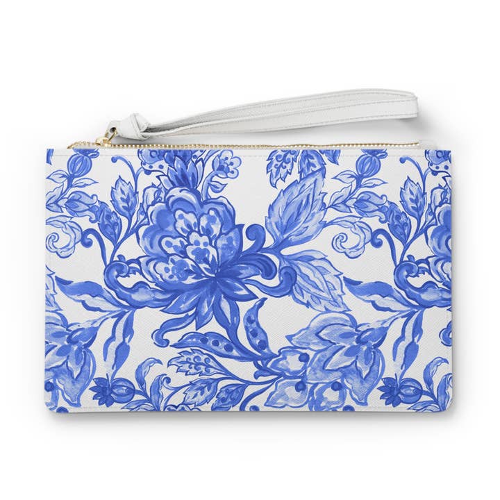 Pochette floreale blu e bianca, borsa a mano in pelle vegana. per la vendita all'ingrosso da parte di Lyn Roma