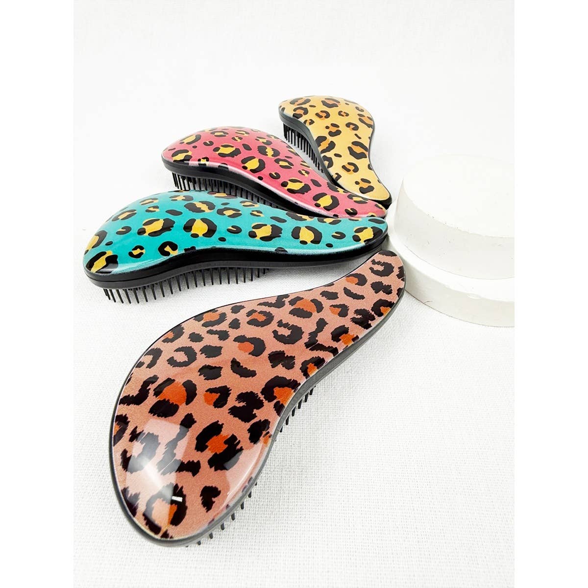 Glide on Easy Grip Leopard Print Hair Brush for wholesale on Faire5