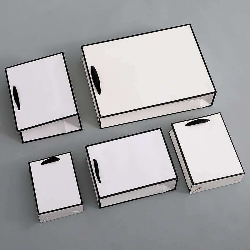 ByHome - Venta al por mayor Bolsas de celofán - Bolsa de regalo blanca con borde negro y papel de seda gratis3