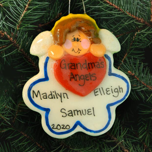 Décoration en forme d'ange sur un nuage pour la vente par Dough Delights, Inc