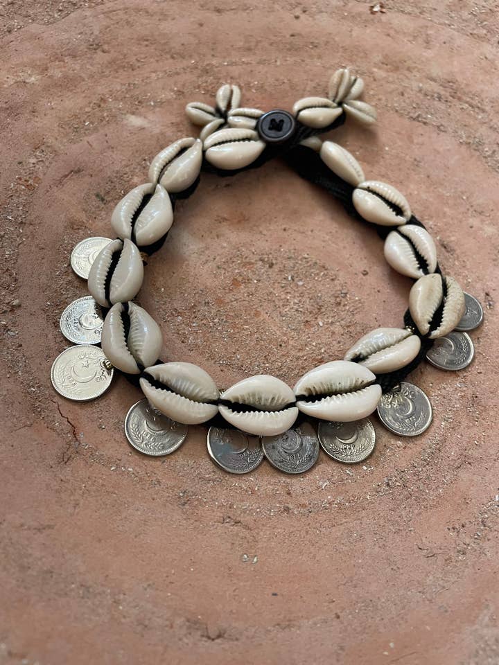 Shell necklace and vintage coins for wholesale by ToutVintage