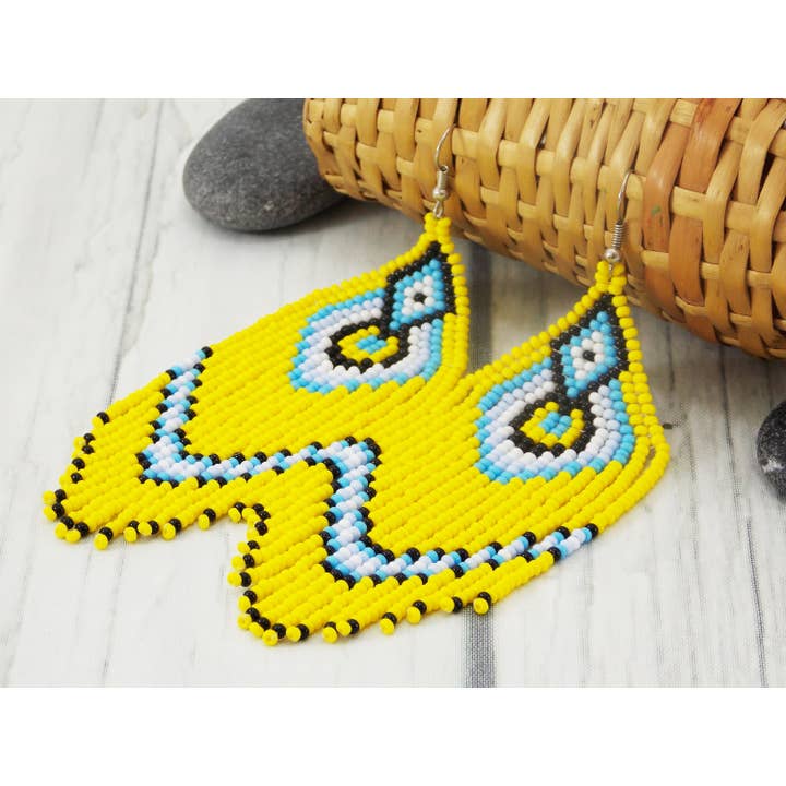 Fødselsdagsgave sort gul smykker lyse gule øreringe lyse smykker marokkanske øreringe kvast smykker Sunshine øreringe karamel smykker for engroshandel hos Ninolia