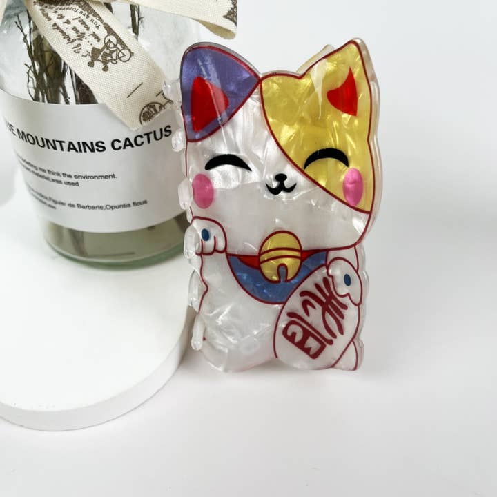 White Japanese Lucky Cat Acrylic Hair Clip for wholesale on Faire